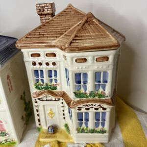 Two Vintage Avon Ceramic Townhouse Canisters